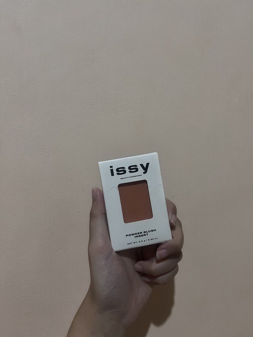 Issy Powder Blush Insert - Temptation (Category: Makeup) located in Tanauan. Submitted by decluttering_mythings (Listing ID 1459790240, Image 1). Description: - Issy Beauty Made Baby Powder Blush insert - Shade: Temptation - Color: Peachy-brown - Finish: Matte - Condition: Brand new in original plastic packaging - Perfect for adding a pop of color to your cheeks.