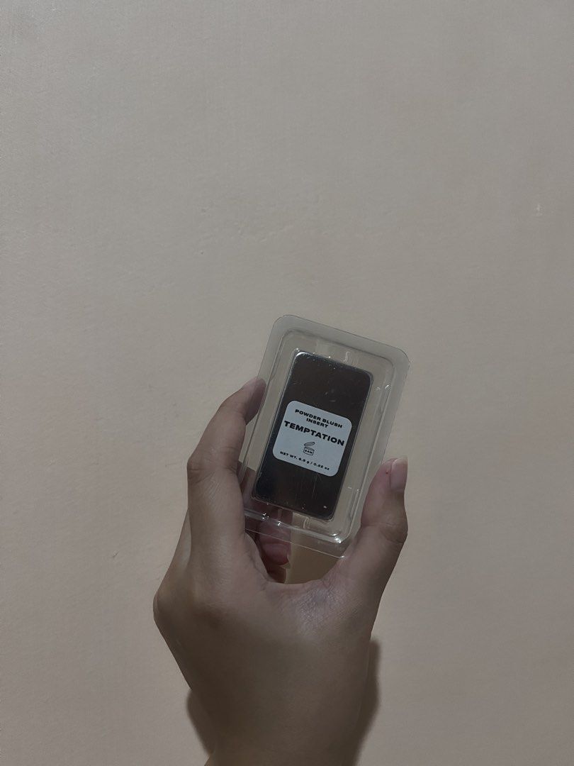 Issy Powder Blush Insert - Temptation (Category: Makeup) located in Tanauan. Submitted by decluttering_mythings (Listing ID 1459790240, Image 2). Description: - Issy Beauty Made Baby Powder Blush insert - Shade: Temptation - Color: Peachy-brown - Finish: Matte - Condition: Brand new in original plastic packaging - Perfect for adding a pop of color to your cheeks.