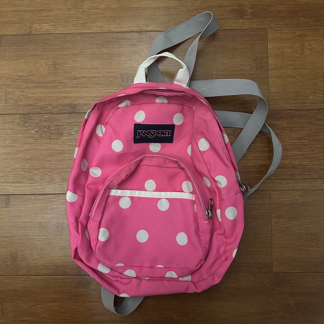 Jansport Pink Polka Dot Mini Backpack (Category: Backpacks) located in Manila. Submitted by wellprelovedthings (Listing ID 1459801333, Image 1). Description: Front zip pocket for easy access Adjustable grey straps Ideal for everyday use or small trips Spacious interior for essentials.