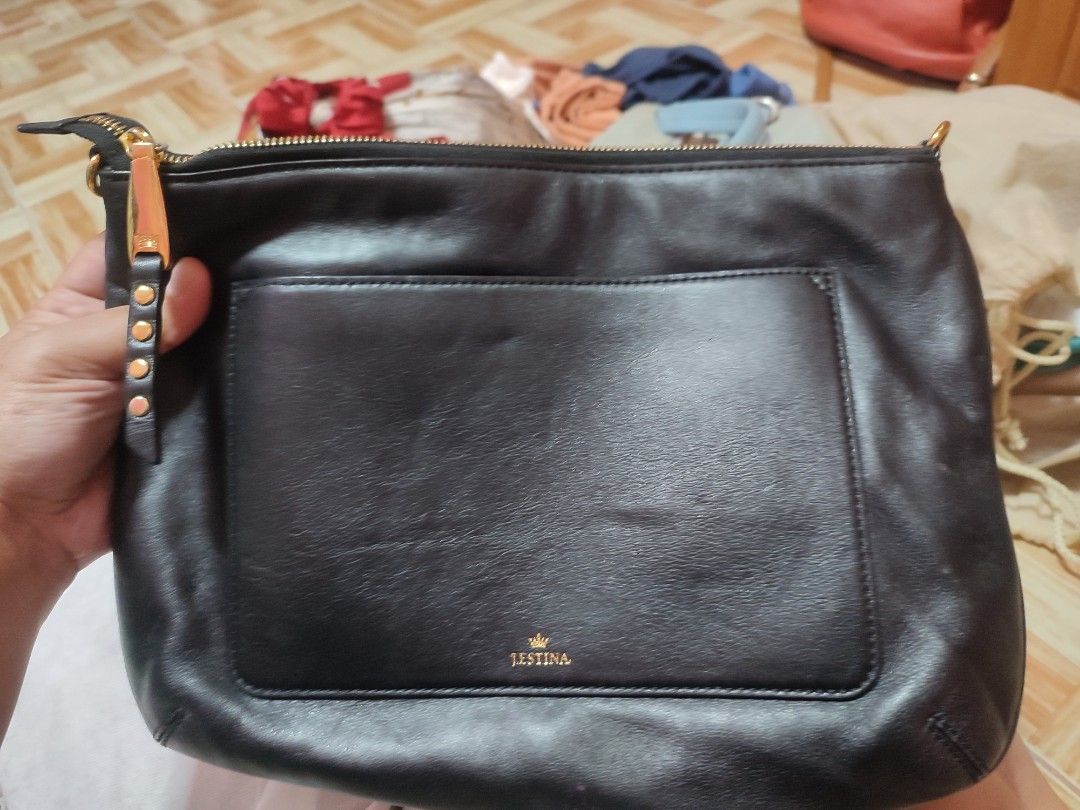 Jestina Sling Bag in Medium size (Category: Cross-body Bags) located in Cavite. Submitted by momandbabypreloved24 (Listing ID 1459817050, Image 3). Description: .