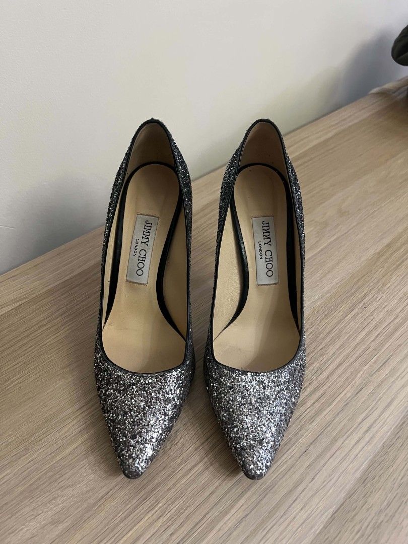 Jimmy Choo Stiletto Pumps – Black/Silver (Category: Heels) located in Manila. Submitted by nicolelaur80143 (Listing ID 1459832054, Image 1). Description: Jimmy Choo London Glitter Pointed-Toe Stiletto Pumps – Black/Silver - Brand: Jimmy Choo - Color: Sparkly Silver Glitter - Style: Classic pointed-toe pump - Heel Height: High - Occasion: Perfect for parties or dressing up any outfit - size :EU 38 - original price: PHP37,500.