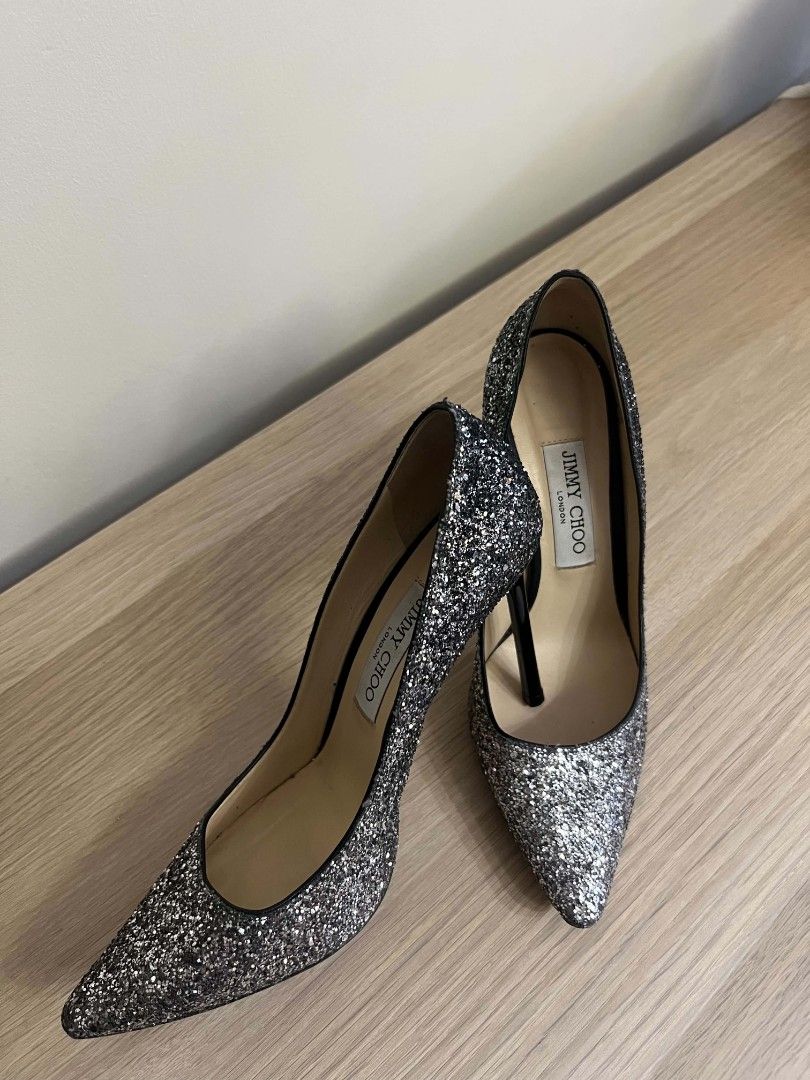 Jimmy Choo Stiletto Pumps – Black/Silver (Category: Heels) located in Manila. Submitted by nicolelaur80143 (Listing ID 1459832054, Image 3). Description: Jimmy Choo London Glitter Pointed-Toe Stiletto Pumps – Black/Silver - Brand: Jimmy Choo - Color: Sparkly Silver Glitter - Style: Classic pointed-toe pump - Heel Height: High - Occasion: Perfect for parties or dressing up any outfit - size :EU 38 - original price: PHP37,500.