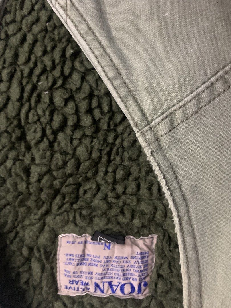 JOAN Active Wear Sherpa Lined Utility Vest (Category: Vests) located in Manila. Submitted by lazyram (Listing ID 1459844930, Image 2). Description: Check Each Photo for Issue and Details.. - Olive green utility vest from JOAN Active Wear - Cozy sherpa lining for extra warmth - Features multiple pockets with secure button and zip closures - Versatile for layering over various outfits - Classic button-front closure.