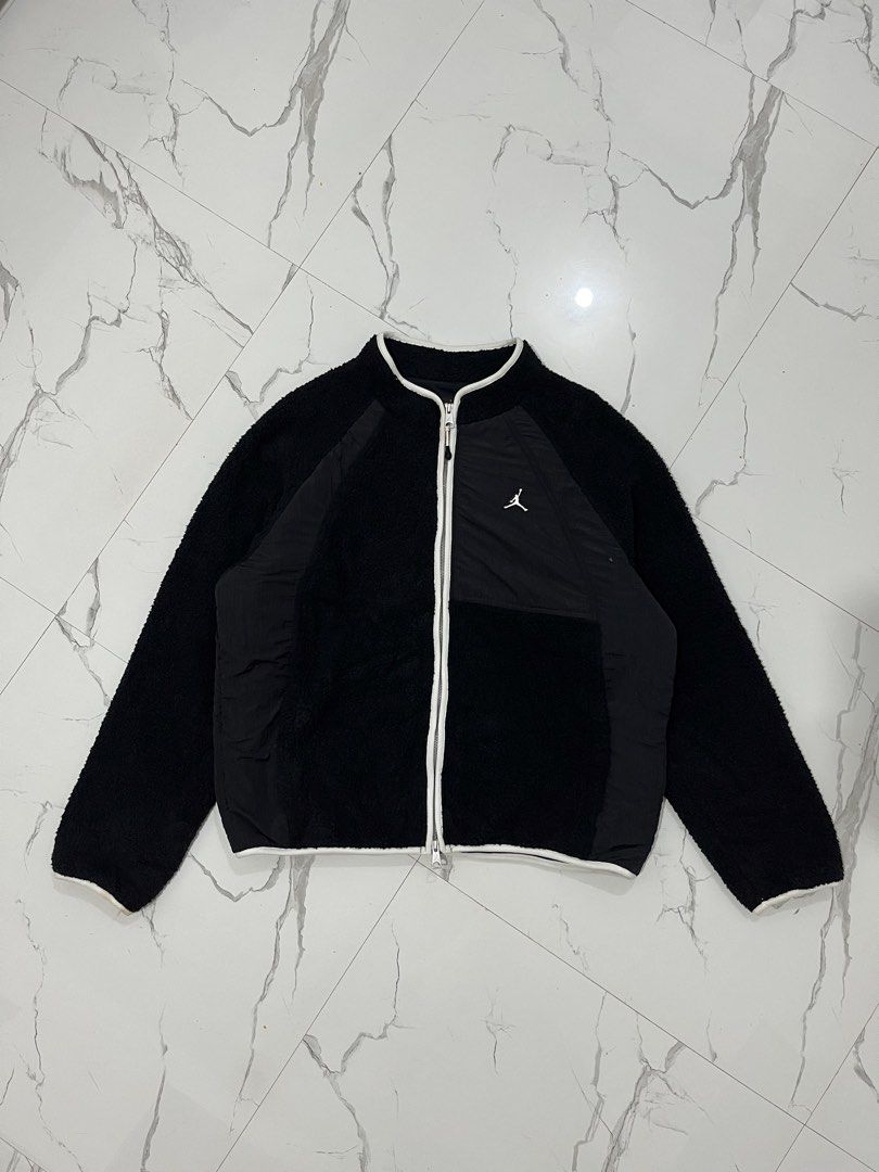 Jordan Fleece Zip-Up Jacket Black (Category: Coats, Jackets and Outerwear) located in Manila. Submitted by obedmagall74424 (Listing ID 1459848004, Image 1). Description: - Black Jordan fleece jacket - Size XXL - Made from soft faux fur - Full zip closure with white trim - Iconic Jumpman logo on the chest - Perfect for staying warm and stylish - Size Xxl 27x25.5 Excellent to new condition No issue 1250+ship.