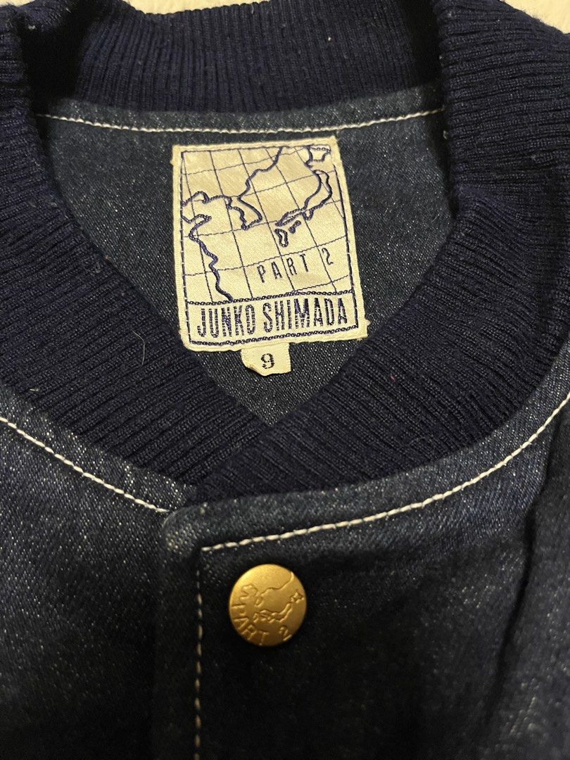Junko Shimada Part 2 Denim Bomber Jacket Size 9 (Category: Coats, Jackets and Outerwear) located in General Santos City (Dadiangas). Submitted by crisjayg (Listing ID 1459716110, Image 2). Description: - Classic denim bomber jacket by Junko Shimada Part 2 - Features stylish gold button closure - Ribbed collar, cuffs, and hem for a comfortable fit - Proudly Made in Japan - Crafted from a durable cotton and polyurethane blend - Measurements: Length
