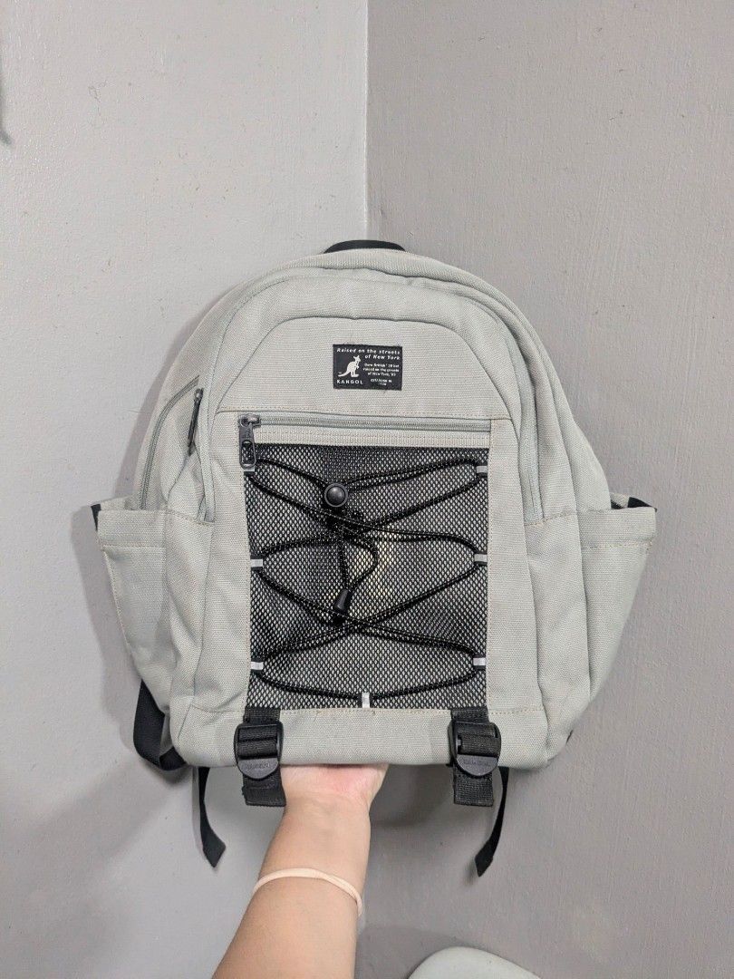 Kangol Flash Mesh Light Gray Backpack (Category: Backpacks) located in Quezon City. Submitted by nnncorner (Listing ID 1459865636, Image 1). Description: Authentic Kangol Flash Mesh Light Gray Backpack 100% authentic Height 18 inches Width 14 inches Bottle Pocket is insulated 9/10 overall condition clean inside and outside has laptop compartment 5900 original price replace 1 zip puller so no any issues. no stains or flaws on corners still present