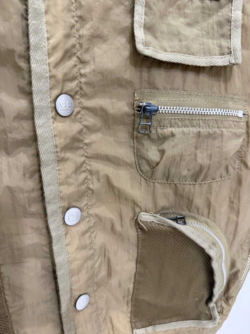 Kansai CC Vest - Beige - Multiple Pockets (Category: Coats, Jackets and Outerwear) located in Baguio. Submitted by printings_ (Listing ID 1459813336, Image 3). Description: - Beige Kansai CC vest - Numerous pockets for ample storage - Mesh side panels for enhanced breathability - Button front closure - Ideal for outdoor activities or as a layering piece - Tag indicates model WX710N Width - 20” Back Length - 20” Shoulders - 17” All measurements ar
