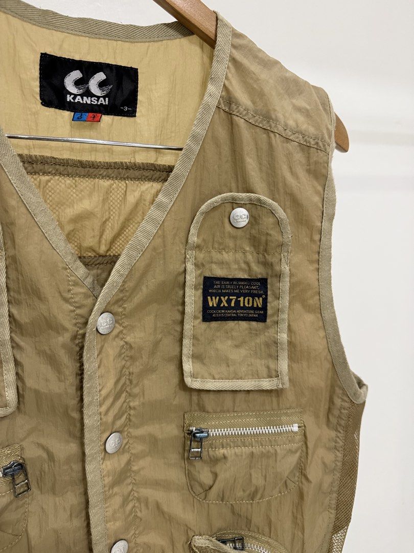 Kansai CC Vest - Beige - Multiple Pockets (Category: Coats, Jackets and Outerwear) located in Baguio. Submitted by printings_ (Listing ID 1459813336, Image 2). Description: - Beige Kansai CC vest - Numerous pockets for ample storage - Mesh side panels for enhanced breathability - Button front closure - Ideal for outdoor activities or as a layering piece - Tag indicates model WX710N Width - 20” Back Length - 20” Shoulders - 17” All measurements ar