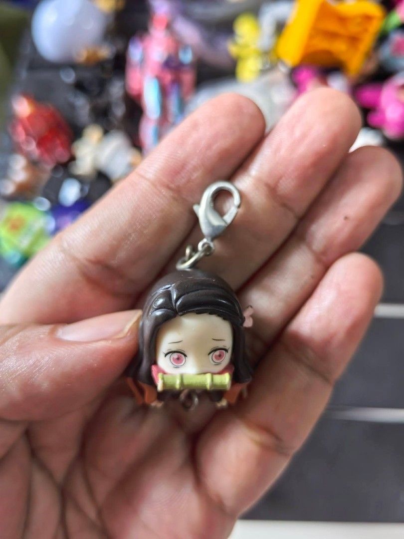 Keychain - Nezuko Kamado (Category: Charms) located in Cebu City. Submitted by dudes_villanueva (Listing ID 1459738483, Image 3). Description: Keychain - Nezuko Kamado from the anime Demon Slayer: Kimetsu no Yaiba 📌 Featuring her signature bamboo mouthpiece and pink eyes..