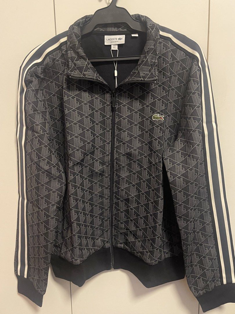 Lacoste jacket (Category: Coats, Jackets and Outerwear) located in Manila. Submitted by alldayshoppinggirl (Listing ID 1459704631, Image 1). Description: 💯 Original Store bought Negotiable Lacoste Paris Jacquard Monogram Zipped Sweatshirt in black and graphite, featuring an all-over geometric monogram pattern and contrasting stripe detailing along the sleeves. The target body measurements and exact dimensions for this jacket in a Size 5 (Large) 