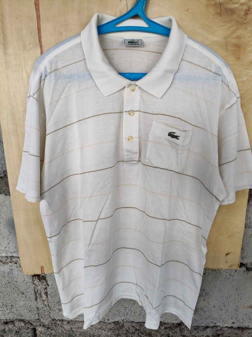 Lacoste polo shirt (Category: Tshirts & Polo Shirts ) located in La Carlota. Submitted by a_leam_art (Listing ID 1459776975, Image 1). Description: Embroidered logo 📍Dimes: W21 x L25 📍Condition: Good 📍Issue: --- 📍Color rate: 9/10.