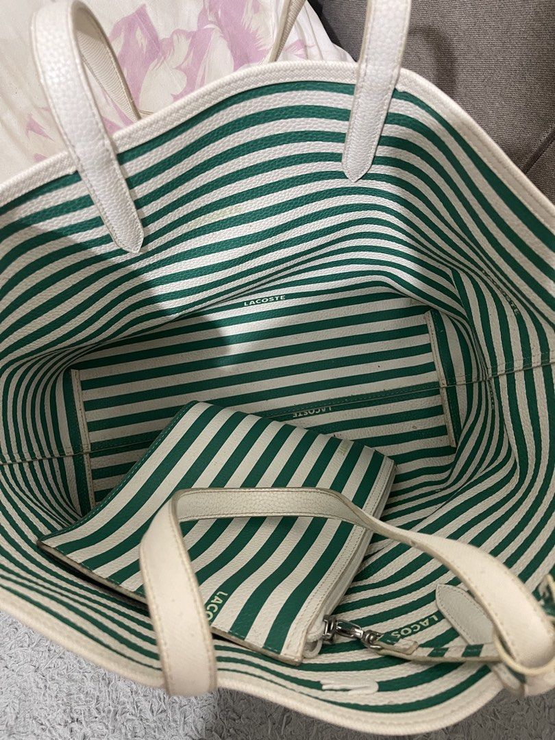 Lacoste Tote Bag with Pouch - Green Stripe (Category: Tote Bags) located in Cavite. Submitted by chamieee_ (Listing ID 1459780314, Image 2). Description: - Authentic Lacoste tote bag - Classic green and white stripes - Includes a matching zippered pouch - Interior also features stripes - White handles - Ideal for everyday errands or travel.