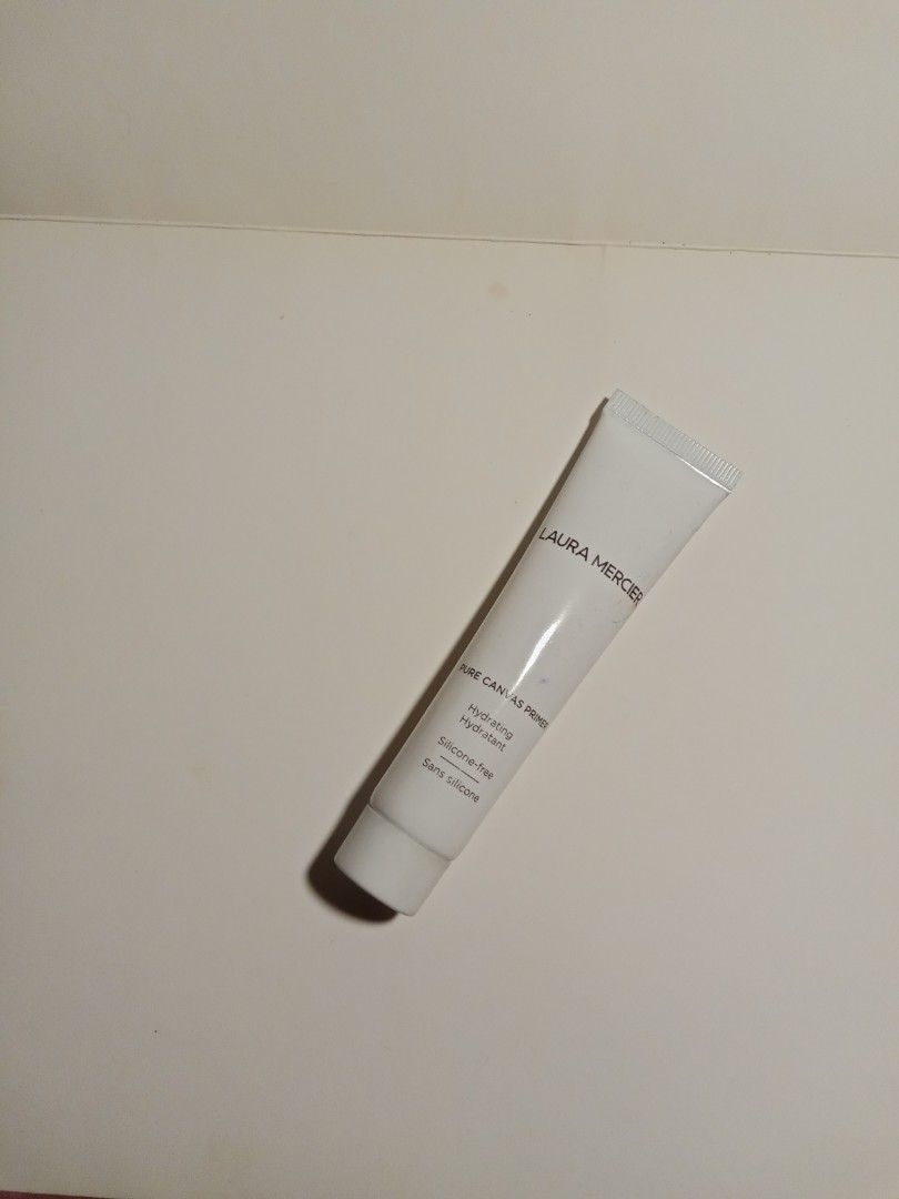 Laura Mercier Pure Canvass Primer (Category: Makeup) located in Silang. Submitted by clementinelovestodeclutter (Listing ID 1459848636, Image 1). Description: Auth Laura Mercier Pure Canvass Primer 70% products left inside..