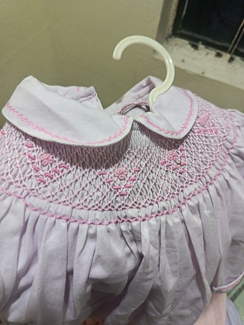 Lavender Smocked Bubble Romper with Pink Trim (Category: Babies & Kids Fashion) located in Candelaria. Submitted by cestlovie (Listing ID 1459798244, Image 3). Description: - Sweet lavender bubble romper 18months - Delicate pink smocking around the collar - Cute little pockets with pink stitching - Puff sleeves and bubble hem - Snaps at the bottom for easy changes - Adorable for any little one.