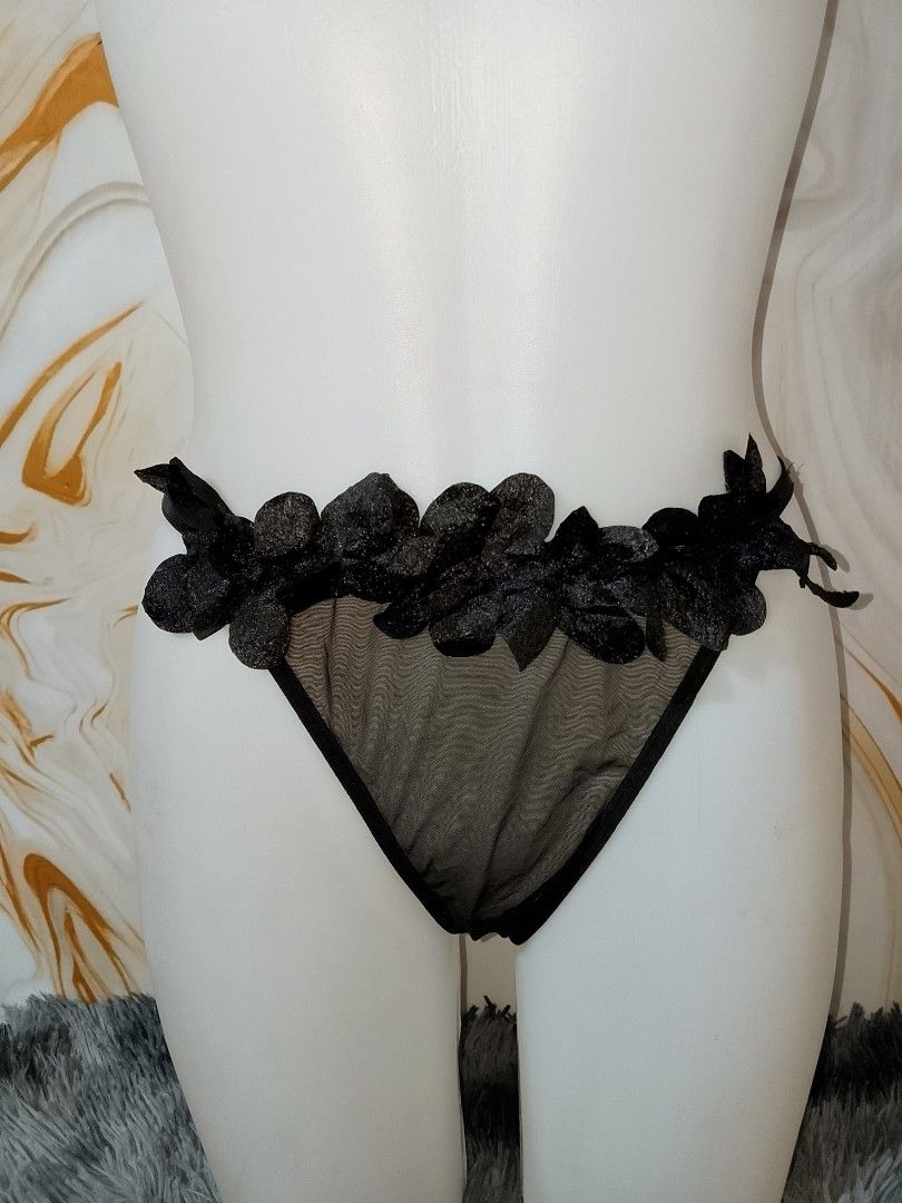 L::Black Mesh G-String with Floral Appliques (Category: Undergarments & Loungewear) located in Manila. Submitted by truecrystal-1407 (Listing ID 1459796921, Image 1). Description: - Sheer black mesh g-string - Delicate floral appliques on waistband - Adjustable straps for a comfortable fit - Ruffled tulle detail on the back - Alluring and delicate design.