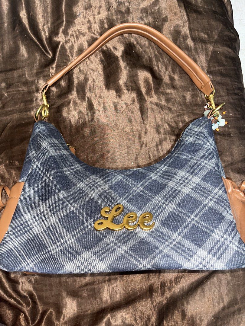 Lee Denim Plaid Shoulder Bag (Category: Shoulder Bags) located in Manila. Submitted by dethbalde01295 (Listing ID 1459806982, Image 1). Description: - Classic denim plaid pattern - Signature gold 'Lee' logo - Secure zipper closure - Ideal for everyday use - Spacious enough for essentials Free sf 700 only.