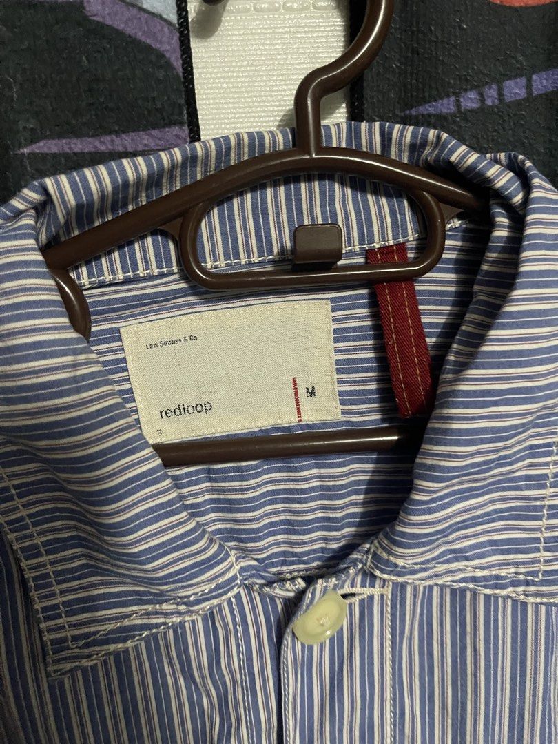 Levi's Redloop Striped Denim Jacket Size M (Category: Coats, Jackets and Outerwear) located in Quezon City. Submitted by listless32 (Listing ID 1459893153, Image 2). Description: W21 L24 Classic Levi's Redloop denim jacket, size M. Blue and white pinstripe. Button-up with chest pockets. Perfect for layering..