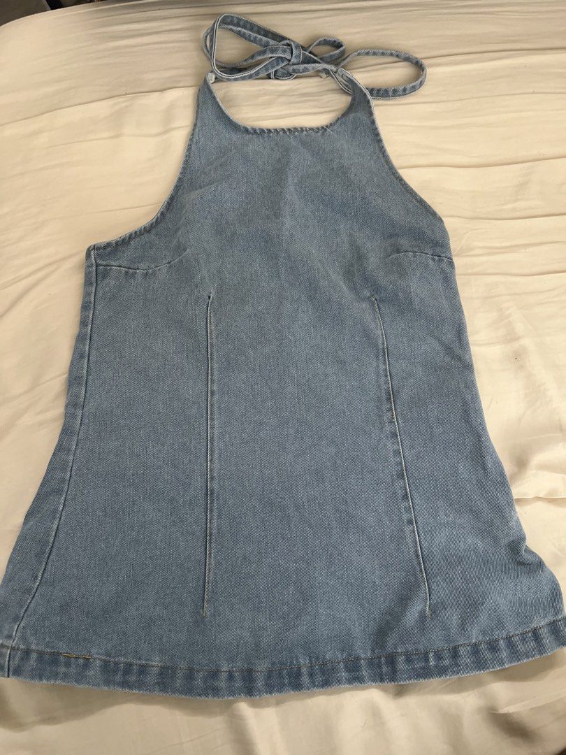 Light Wash Denim Halter Neck Top (Category: Dresses) located in Pasig City. Submitted by crybaby666 (Listing ID 1459744964, Image 1). Description: - Cute light wash denim dress - Halter neck with tie-back closure - Side zipper for easy wear - Flattering A-line silhouette - Versatile for casual outings or dressing up - Pairs well with sneakers or sandals.