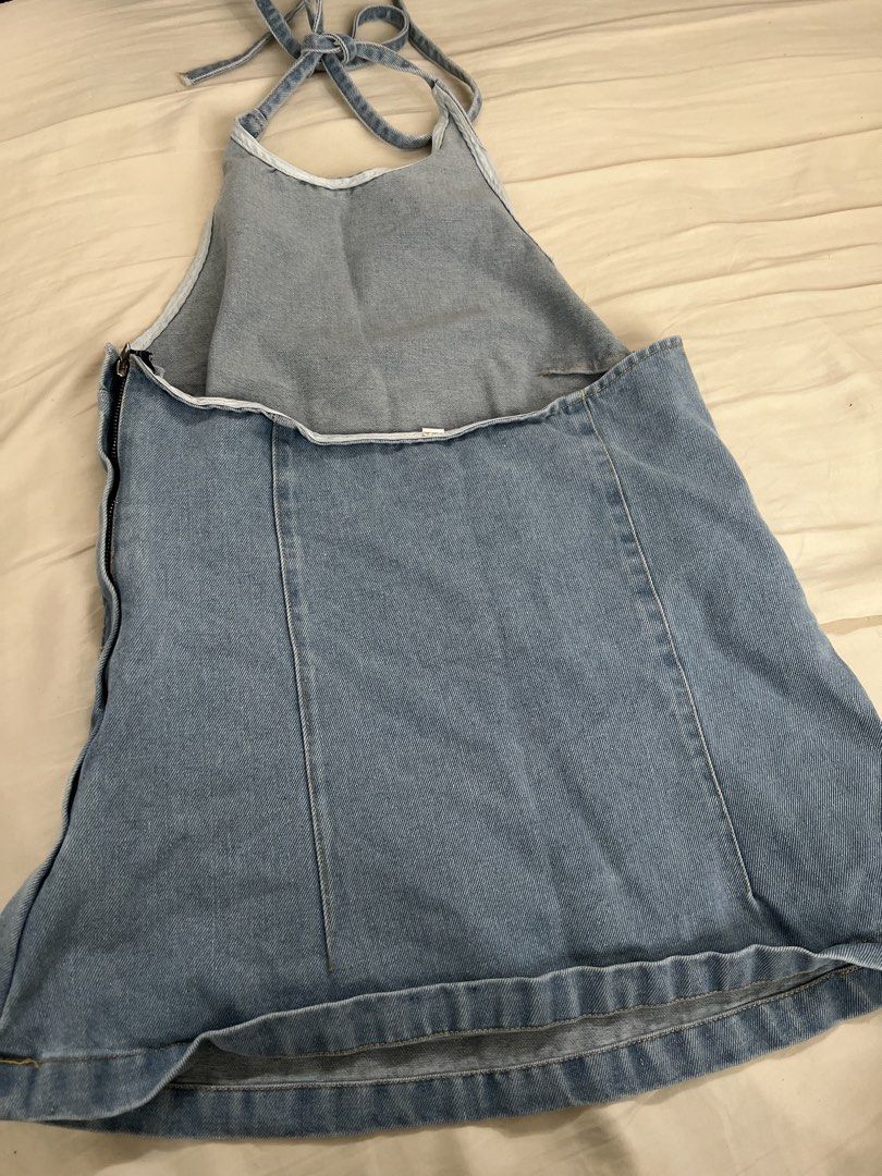 Light Wash Denim Halter Neck Top (Category: Dresses) located in Pasig City. Submitted by crybaby666 (Listing ID 1459744964, Image 2). Description: - Cute light wash denim dress - Halter neck with tie-back closure - Side zipper for easy wear - Flattering A-line silhouette - Versatile for casual outings or dressing up - Pairs well with sneakers or sandals.