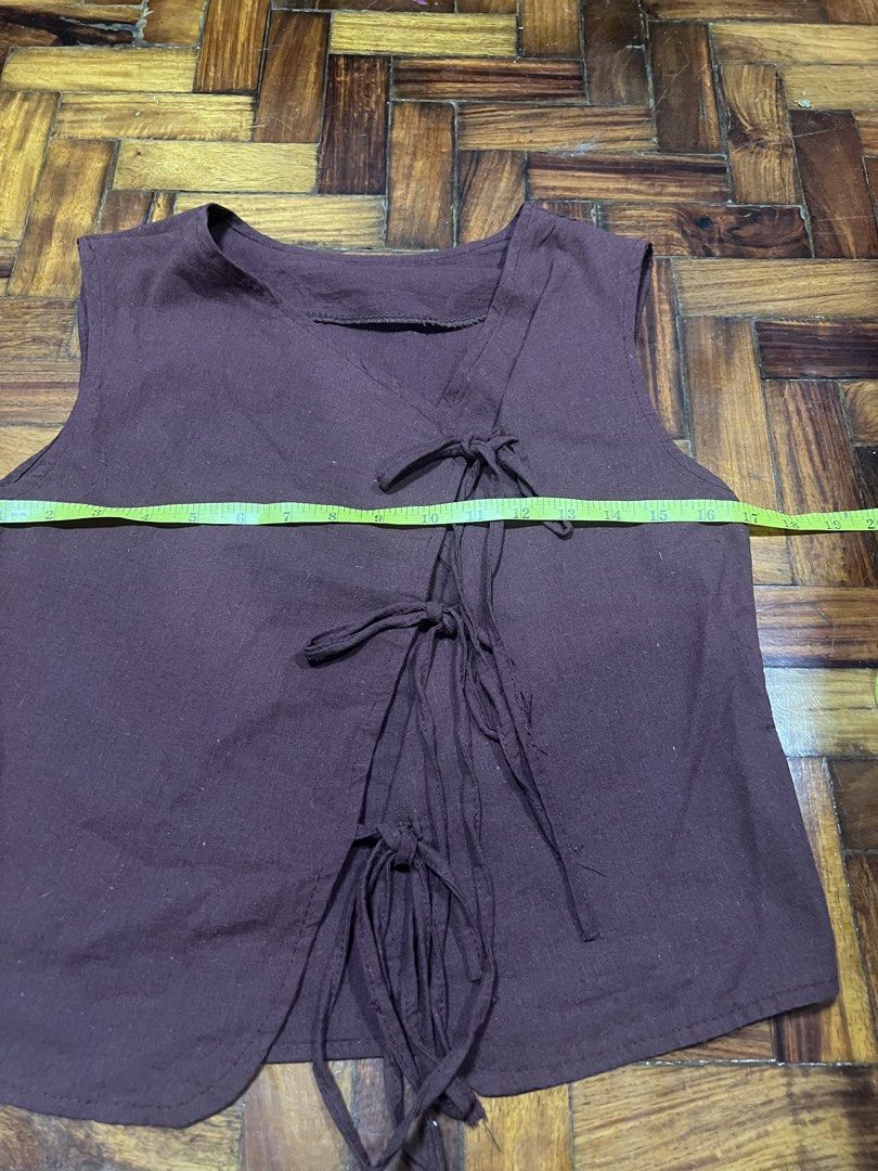 Linen Front Tie Top (Category: Others Tops) located in Quezon City. Submitted by chloe_declutter (Listing ID 1459776257, Image 2). Description: Open to pickup/j&t delivery Cubao QC location Still available 9/26 Code: Teal Box.