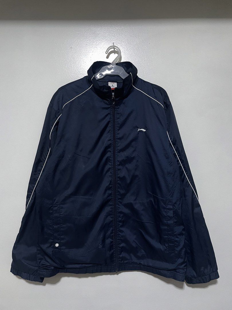 Li-Ning Navy Blue Track Jacket Size L (Category: Coats, Jackets and Outerwear) located in Manila. Submitted by commonselection (Listing ID 1459800524, Image 1). Description: Navy Blue Large 28x23 Issue stain lower part Puller.