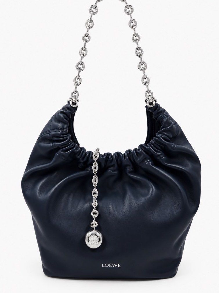 ⚜️Loewe Squeeze small bag (Category: Luxury Bags & Wallets) located in Makati City. Submitted by 90sangel (Listing ID 1459645256, Image 2). Description: She’s soft, slouchy & seriously addictive. 🫶🏼 * Not your basic shoulder bag — she’s the Squeeze. 😮‍💨💙 *Includes store dustbag, carecard and loewe paperbag ✨ *Box is optional and not included from the SALE Price 🏷️.