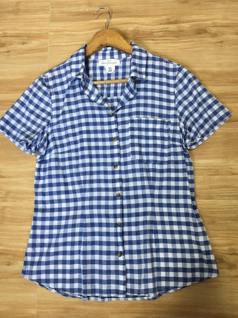 L.O.G.G. Blue Gingham Button-Up Shirt (Category: Blouses) located in Davao. Submitted by parenasnic86577 (Listing ID 1459723814, Image 1). Description: - Blue and white gingham pattern - Short sleeves - Collared neckline - Button-up front - Chest pocket - Brand: L.O.G.G. - Comfortable and casual style - Perfect for everyday wear.