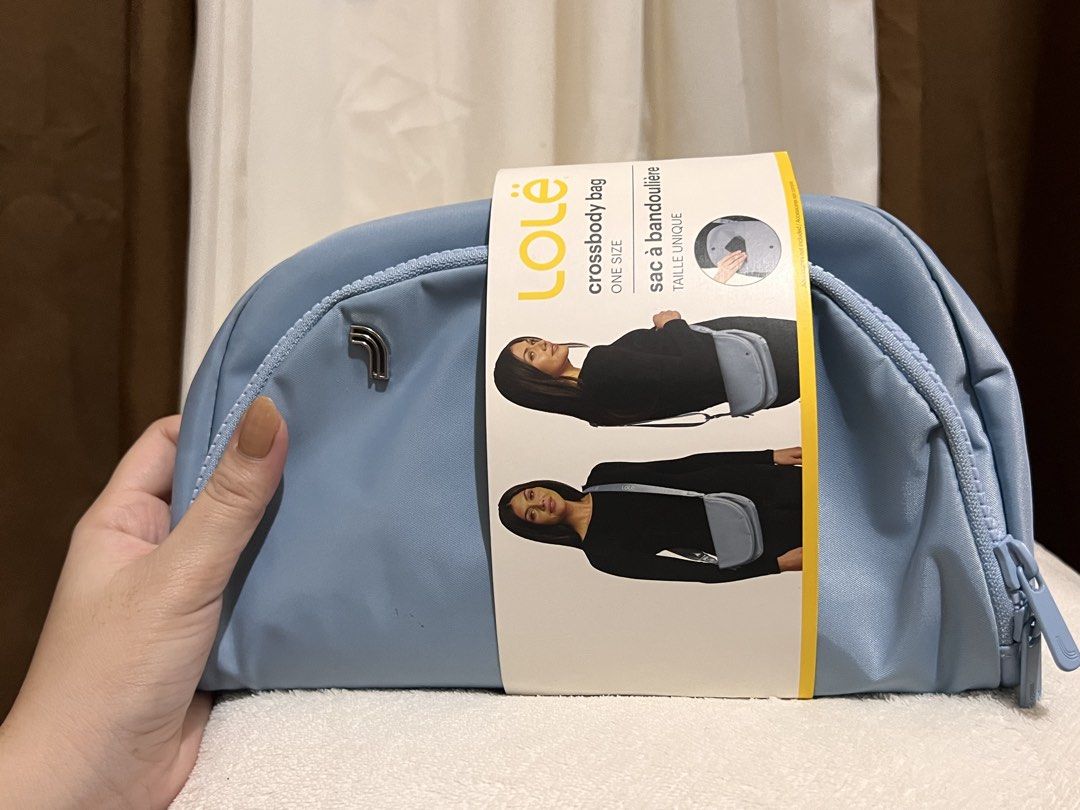 Lole Light Blue Crossbody Bag (Category: Cross-body Bags) located in Manila. Submitted by catherinequijano_1 (Listing ID 1459868619, Image 1). Description: - Brand: Lole - Color: Light Blue - Style: Crossbody Bag - Features: Main zippered compartment, front pocket with snap closure - Interior: Satin lined - Ideal for: Everyday use, travel - Condition: Brand new with original tag.