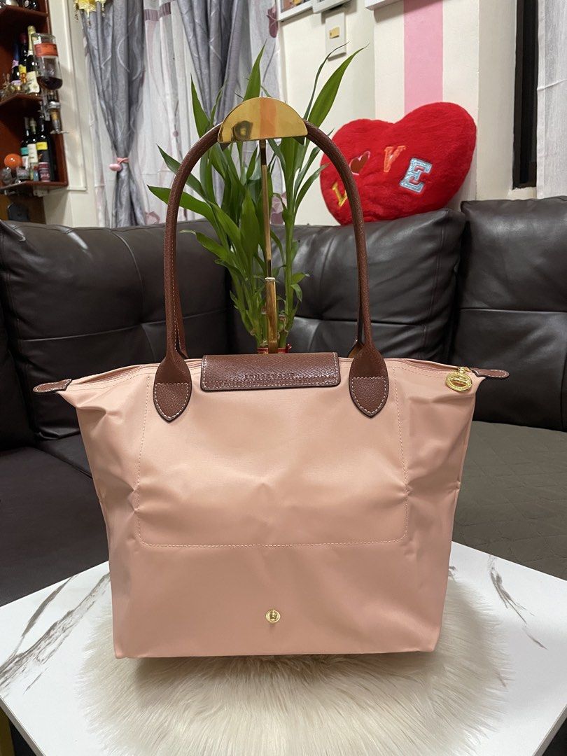 Longchamp Tote Bag(Medium) (Category: Tote Bags) located in Mandaue City. Submitted by ludz_0246 (Listing ID 1459853940, Image 2). Description: Ykk Zipper Long handle White Etekita In Pink Brown With Box Made in France Medium Size Good as new .