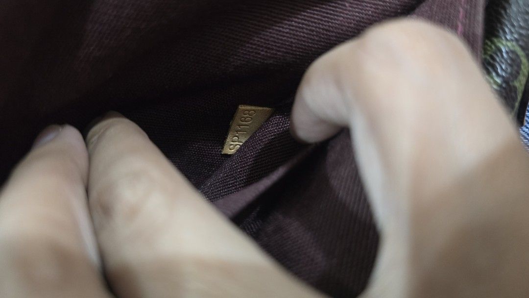Louis Vuitton coded Monogram Pochette Shoulder Bag (Category: Luxury Bags & Wallets) located in Quezon City. Submitted by mbpreloved65 (Listing ID 1459817326, Image 3). Description: - Louis Vuitton Pochette - Classic Monogram Canvas - Gold Chain Strap - Leather Trim - Interior Pocket - Date Code: SP1168 - Ideal for carrying essentials.