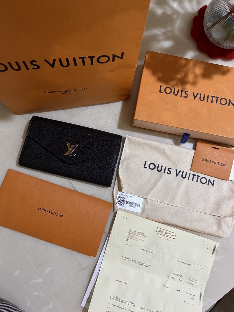 Louis Vuitton My Lockme Wallet Noir (Category: Luxury Bags & Wallets) located in Angeles City. Submitted by Mica0730 (Listing ID 1459713064, Image 3). Description: 🖤 AUTHENTIC LOUIS VUITTON MYLOCKME WALLET — BLACK 🖤 Selling my authentic LV MyLockMe Wallet in Black. Purchased from LV Greenbelt. ✨ 📦 FULL SET: • Original Box • Dust Bag • Paper Bag • Store Receipt ✨ Condition: The exterior is still beautiful and the wallet is structurally sound. H