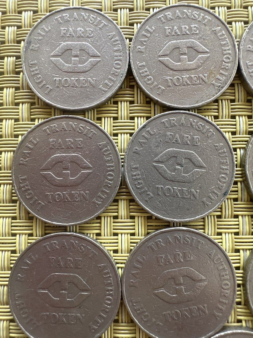 LRT fare token (13pcs) 1980 (Category: Currency) located in Manila. Submitted by ellie.copter (Listing ID 1459733300, Image 2). Description: - Set of 13 Rail Transit Authority fare tokens. - Features the 'H' logo and 'RAIL TRANSIT AUTHORITY FARE TOKEN' inscription - Perfect for collectors or as a unique display item.
