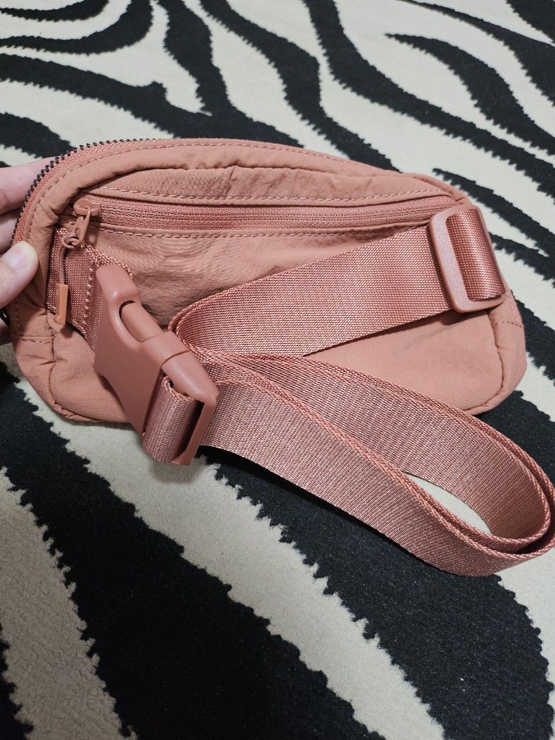Lululemon Everywhere Belt Bag Pouch Pink (Category: Purses & Pouches) located in Manila. Submitted by shopby_g (Listing ID 1459822350, Image 3). Description: - Slightly used. but not abused - Dusty rose Lululemon pouch - Zipper closure - Interior mesh pockets - Adjustable strap with buckle - Ideal for carrying essentials RFS :: Declutter.