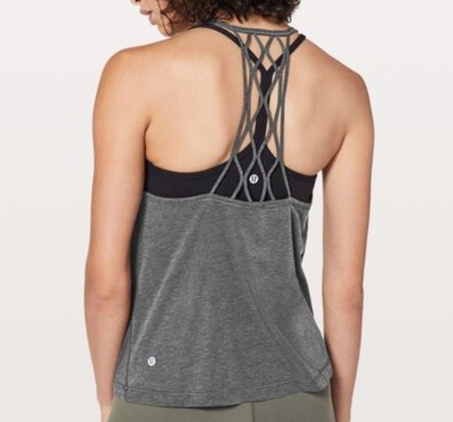 Lululemon Love Knot Tank Top (Category: Activewear) located in Tuguegarao City. Submitted by thriftedtreasures101.1 (Listing ID 1459896157, Image 3). Description: Lululemon Love Knot Tank in the color Heathered Black. This popular style is designed for low-impact yoga or gym practices. It features a loose, flowing fit, a classic scoop neckline and an intricate lattice design at the back. Slightly used, in good condition. Color may vary due to lig