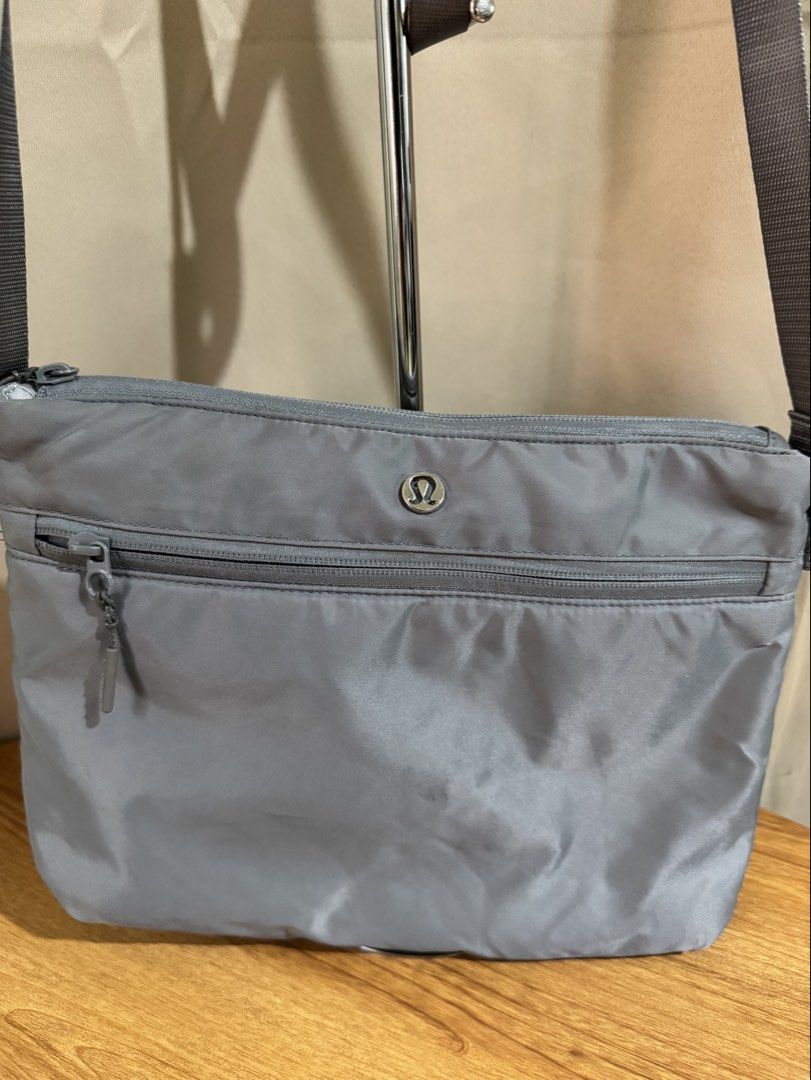 lululemon New Parent Backpack 17L Removable Crossbody Pouch (Category: Cross-body Bags) located in Quezon City. Submitted by areux (Listing ID 1459776220, Image 2). Description: This is the pouch that comes with the New Parent Backpack. The pouch is actually very useful on its own, even if you don’t use it as part of the diaper bag. Great for travel, errands, shopping or everyday use. Surprisingly spacious for a small bag. I used to carry small w