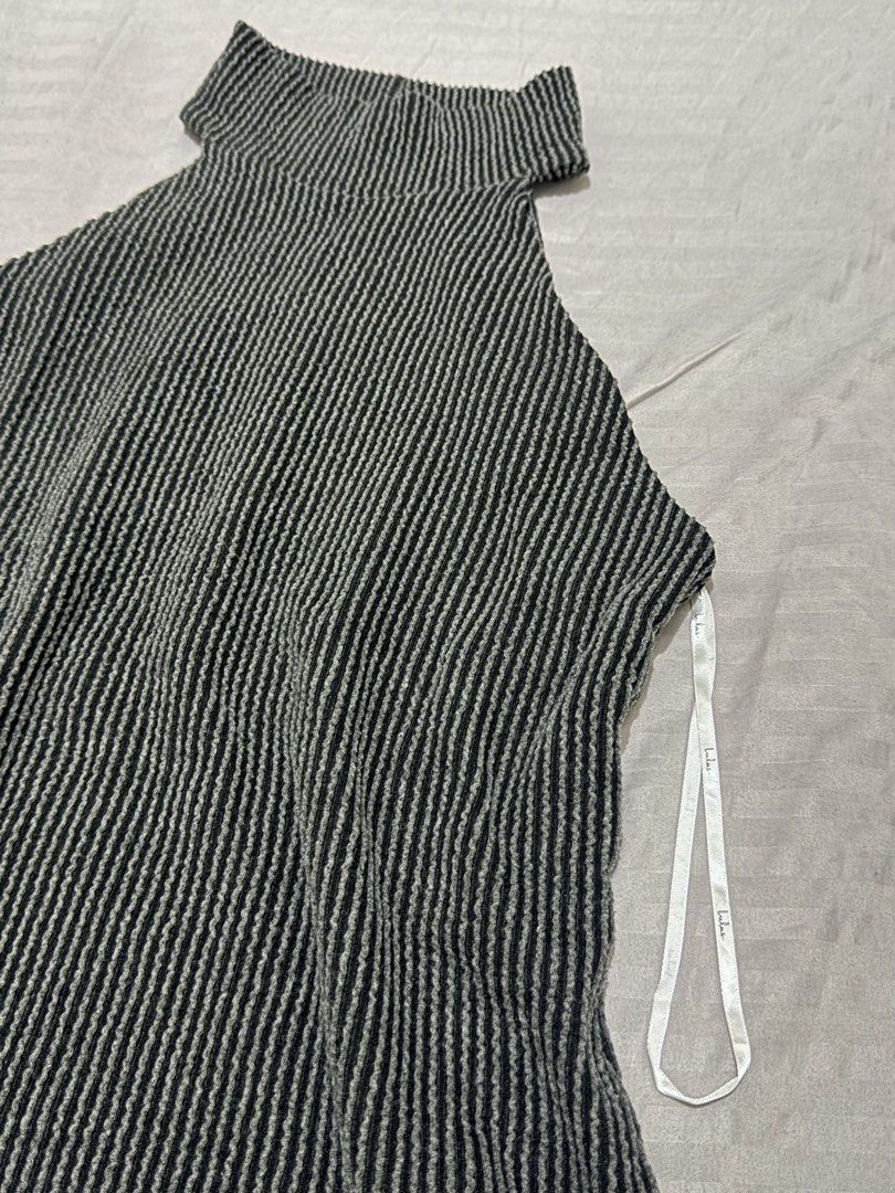 Lulus Striped Mock Neck Halter Bodysuit (Category: Sleeveless) located in Manila. Submitted by _dyclutter (Listing ID 1459779998, Image 2). Description: • Grey and black striped bodysuit from Lulus •mock neck • Material: Polyester, Nylon, Spandex • Perfect for dressing up or down • Like new, never been used.
