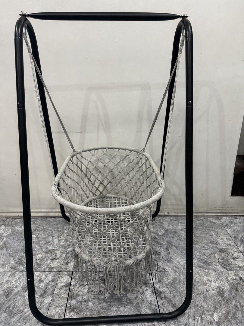 Macrame Baby Hammock Swing with Stand (Category: Outdoor Furniture) located in Bulacan. Submitted by jcc321 (Listing ID 1459711489, Image 2). Description: - Cute macrame baby hammock - Sturdy black metal stand included - Made of woven cotton rope - Soft white cushion for comfort - Easy to assemble and move - Perfect for nursery or living room Ayaw higaan ng baby ko, 1 beses lang nya nagamit.