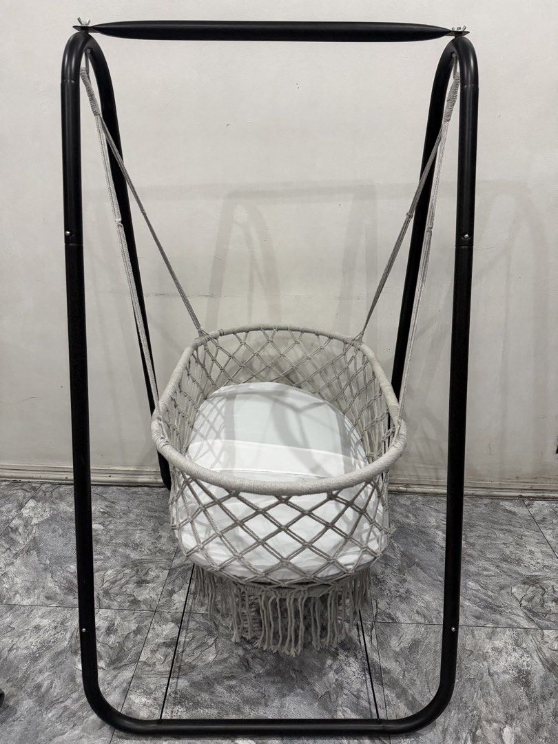 Macrame Baby Hammock Swing with Stand (Category: Outdoor Furniture) located in Bulacan. Submitted by jcc321 (Listing ID 1459711489, Image 1). Description: - Cute macrame baby hammock - Sturdy black metal stand included - Made of woven cotton rope - Soft white cushion for comfort - Easy to assemble and move - Perfect for nursery or living room Ayaw higaan ng baby ko, 1 beses lang nya nagamit.
