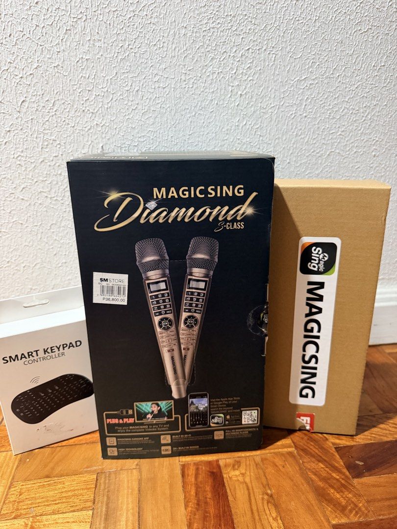 Magic Sing Diamond S-Class Karaoke Microphones (Category: Other Audio Equipment) located in Pasig City. Submitted by anne.anne19 (Listing ID 1459900127, Image 2). Description: - Magic Sing Diamond S-Class karaoke microphone - Includes smart keypad controller - Comes with a carrying case and accessories (batteries included) - Easy plug-and-play setup - Connects to any TV - Built-in Wi-Fi for app access - Features many built-in songs - with freebie