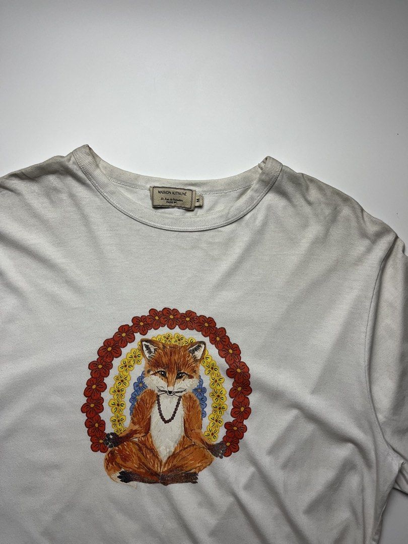 Maison Kitsuné Meditating Fox Tshirt (Category: Tshirts & Polo Shirts ) located in Manila. Submitted by streetsavvy (Listing ID 1459794141, Image 2). Description: Maison Kitsuné Meditating Fox Tshirt Size: Medium Width: 20” Length: 28” Shoulder: 18” Sleeve Length: 9” Hem: 20” measured in inches Condition: Very good condition with signs of use.