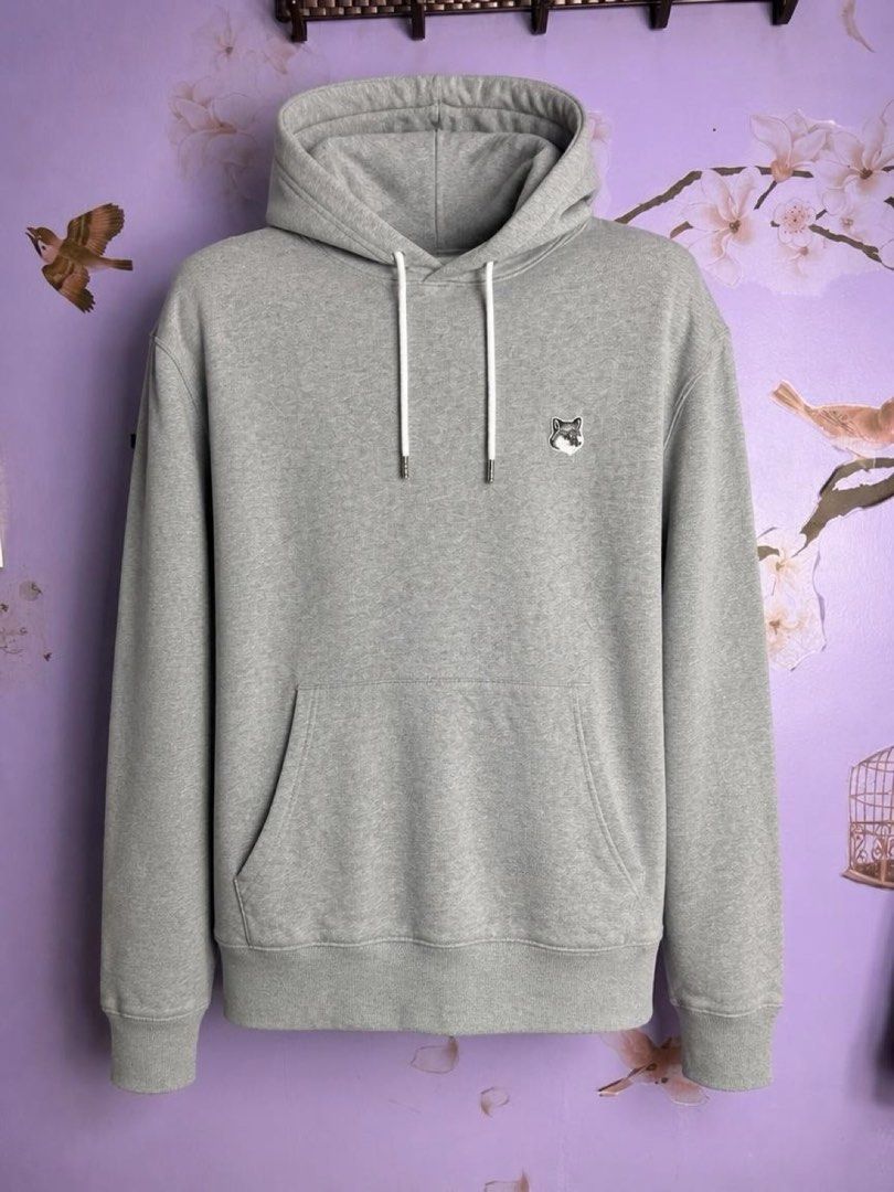 Maison Kitsune Hoodie in Gray (Category: Coats, Jackets and Outerwear) located in Manila. Submitted by plonlineclothing (Listing ID 1459754417, Image 1). Description: Maison Kitsune Gray Fox head M on tag W: 22 inches L: 27-28 inches No issues Color rate: 9.8/10.