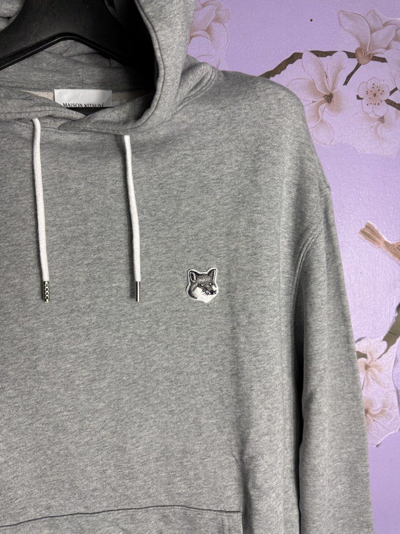 Maison Kitsune Hoodie in Gray (Category: Coats, Jackets and Outerwear) located in Manila. Submitted by plonlineclothing (Listing ID 1459754417, Image 3). Description: Maison Kitsune Gray Fox head M on tag W: 22 inches L: 27-28 inches No issues Color rate: 9.8/10.
