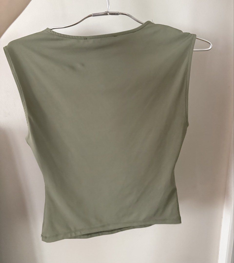 Mango Olive Green Square Neck Sleeveless Top (Category: Sleeveless) located in Manila. Submitted by curatedclosetbyj (Listing ID 1459775030, Image 2). Description: - Brand: Mango/ MNG - Color: Olive Green - Style: Sleeveless top - Neckline: Square.