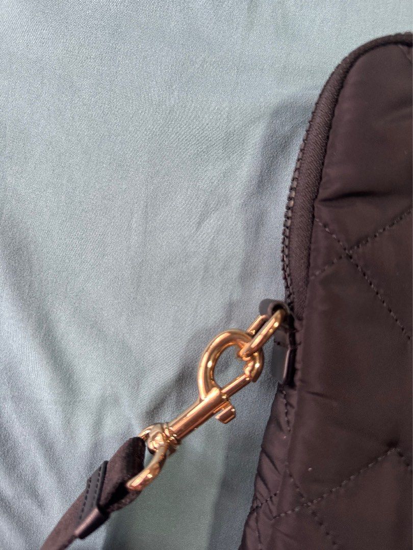 Marc Jacobs Quilted Nylon Laptop Bag (Category: Laptop Bags & Sleeves) located in Makati City. Submitted by bianchiii (Listing ID 1459741392, Image 3). Description: Marc Jacobs Quilted Nylon Laptop Bag in Black and Gold For 13 inches laptop Authentic, bought it from Hong Kong Still in great condition RFS: New laptop is 15 inches, it can’t fit 🥲.