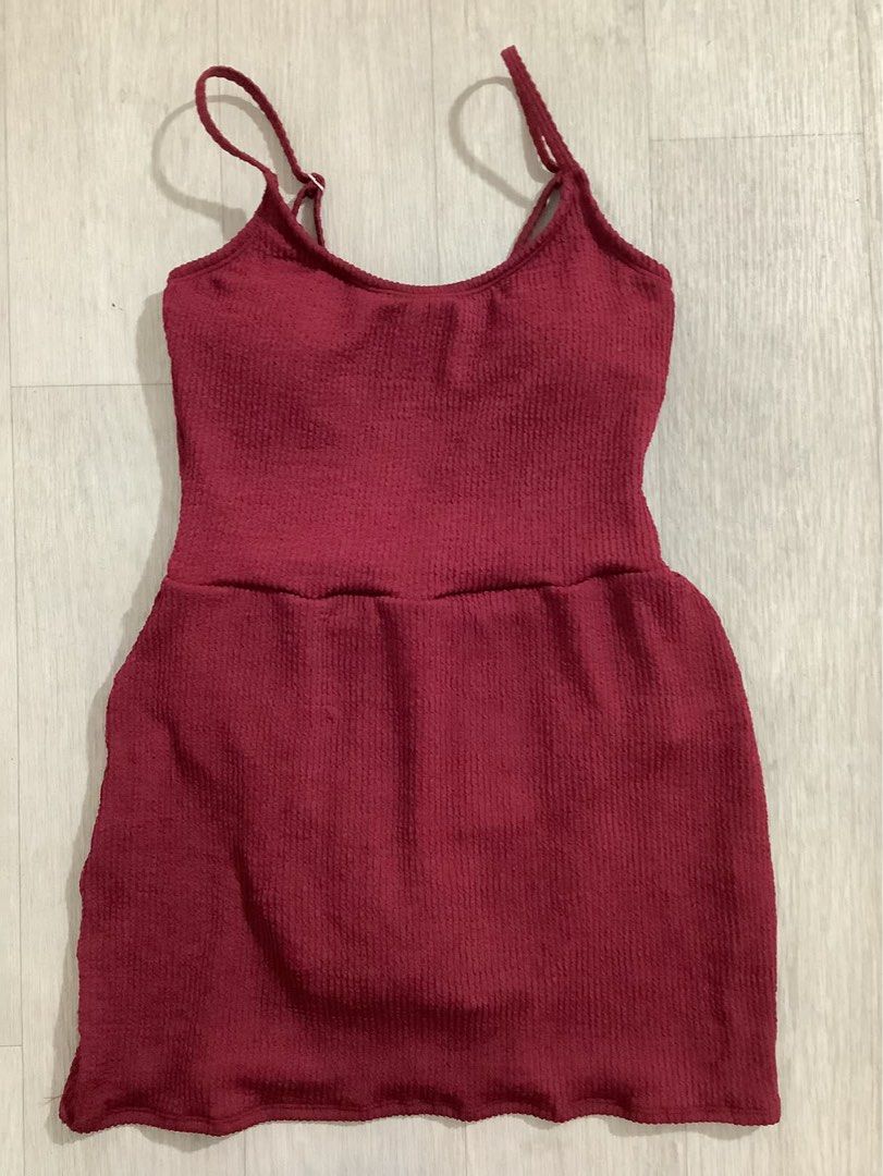 Maroon Ribbed Spaghetti Strap Mini Dress (Category: Dresses) located in Caloocan City. Submitted by soldbyann (Listing ID 1459806312, Image 1). Description: - Cute maroon ribbed mini dress - Adjustable spaghetti straps - Snug, flattering fit - Versatile for night out or casual wear - Textured fabric for added appeal - Easily pairs with heels or sneakers.