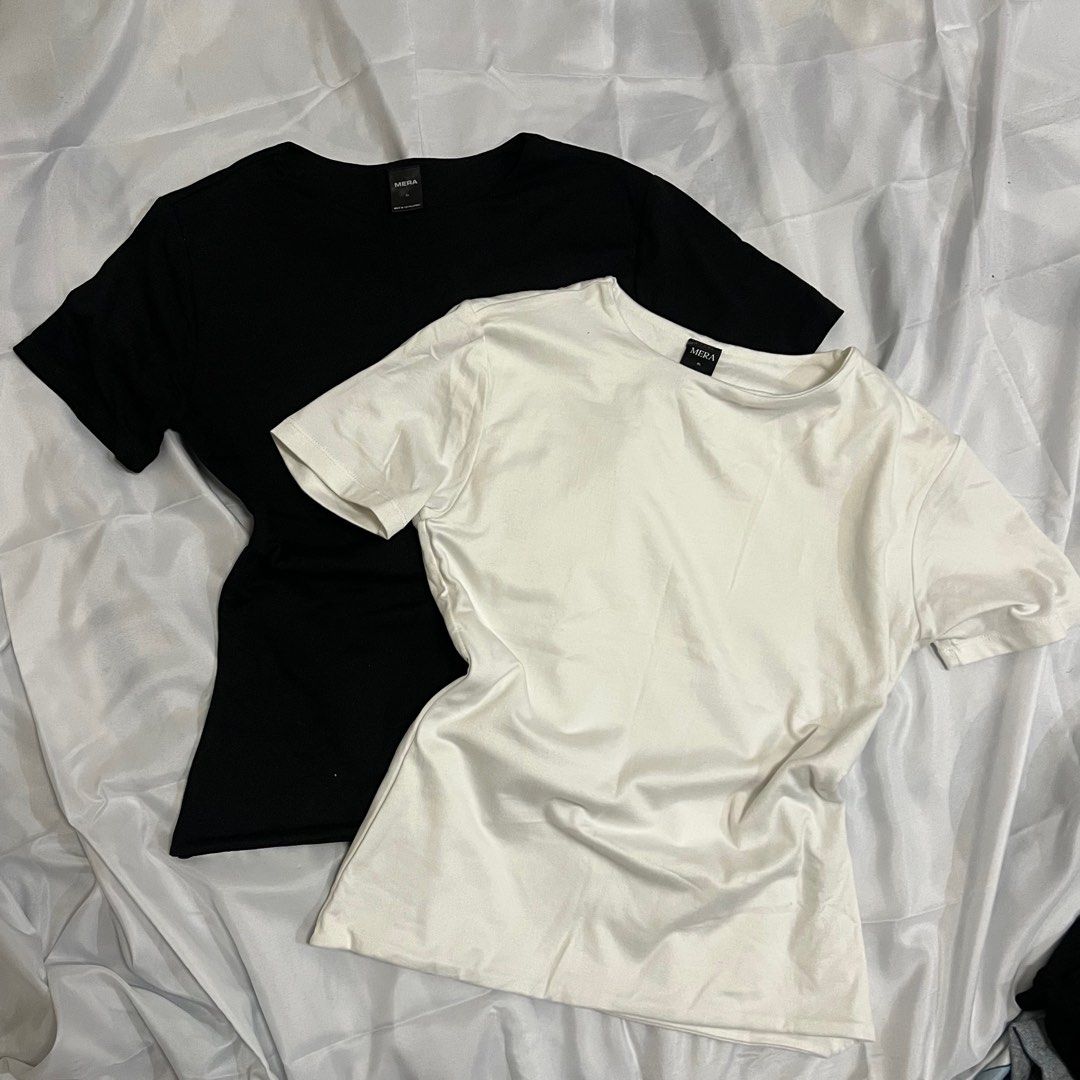 MERA Basic T-Shirts (Black & White) (Category: Shirts) located in Imus. Submitted by niftees.eco (Listing ID 1459709340, Image 1). Description: MERA Basic T-Shirts (Black & White). Set of 2. Short-sleeved, crew neck. Essential wardrobe pieces. Best fit to Medium Price : 190 both (95 each) .
