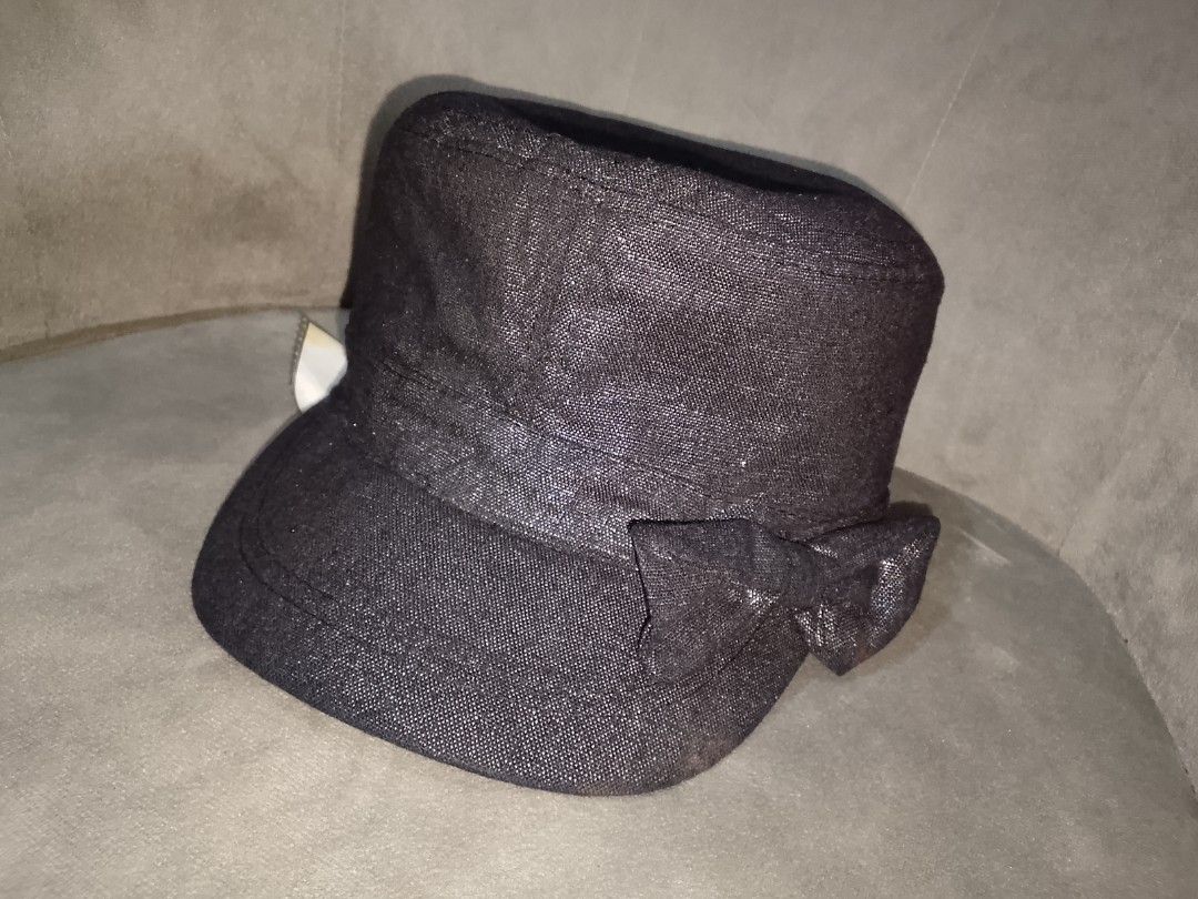 Metallic Black Cadet Style Cap (Category: Hats & Beanies) located in Binangonan. Submitted by yuristalin888 (Listing ID 1459821500, Image 3). Description: This stylish black cadet/military-style cap features a subtle metallic shimmer woven throughout the fabric, a structured flat-top crown, and a curved brim. It is gracefully finished with a matching side bow accent..