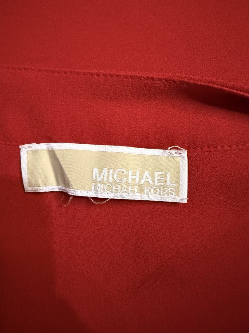 MICHAEL KORS Red Button-Front Midi Dress (Category: Dresses) located in Santiago. Submitted by ashley.collection (Listing ID 1459708637, Image 2). Description: - Brand: Michael Kors - Color: Red - Style: Midi Dress - Neckline: V-neck - Closure: Button-front - Sleeves: Long balloon sleeves - Material: Polyester blend - Occasion: Dress up or down.