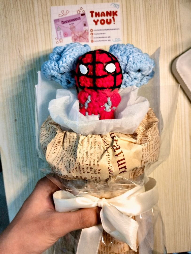 Mini spiderman-chibi bouquet (Category: Figurines & Statues) located in San Pedro. Submitted by crochembrace_lyly (Listing ID 1459809391, Image 1). Description: From ₱690 to ₱300 Only! Can do vc for legitimacy! Includes one spiderman chibi and two blue rose ON-HAND! CAN SHIP ASAP Loc: San Pedro-Muntinlupa boundary .