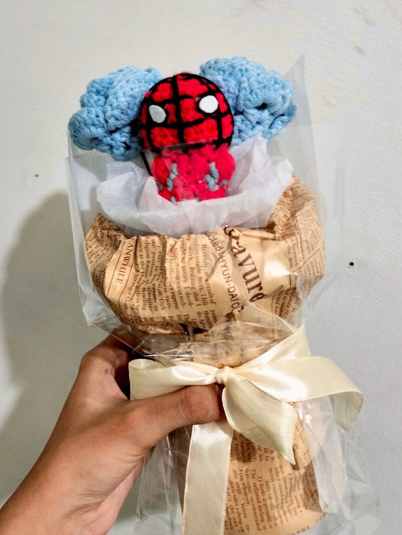 Mini spiderman-chibi bouquet (Category: Figurines & Statues) located in San Pedro. Submitted by crochembrace_lyly (Listing ID 1459809391, Image 2). Description: From ₱690 to ₱300 Only! Can do vc for legitimacy! Includes one spiderman chibi and two blue rose ON-HAND! CAN SHIP ASAP Loc: San Pedro-Muntinlupa boundary .